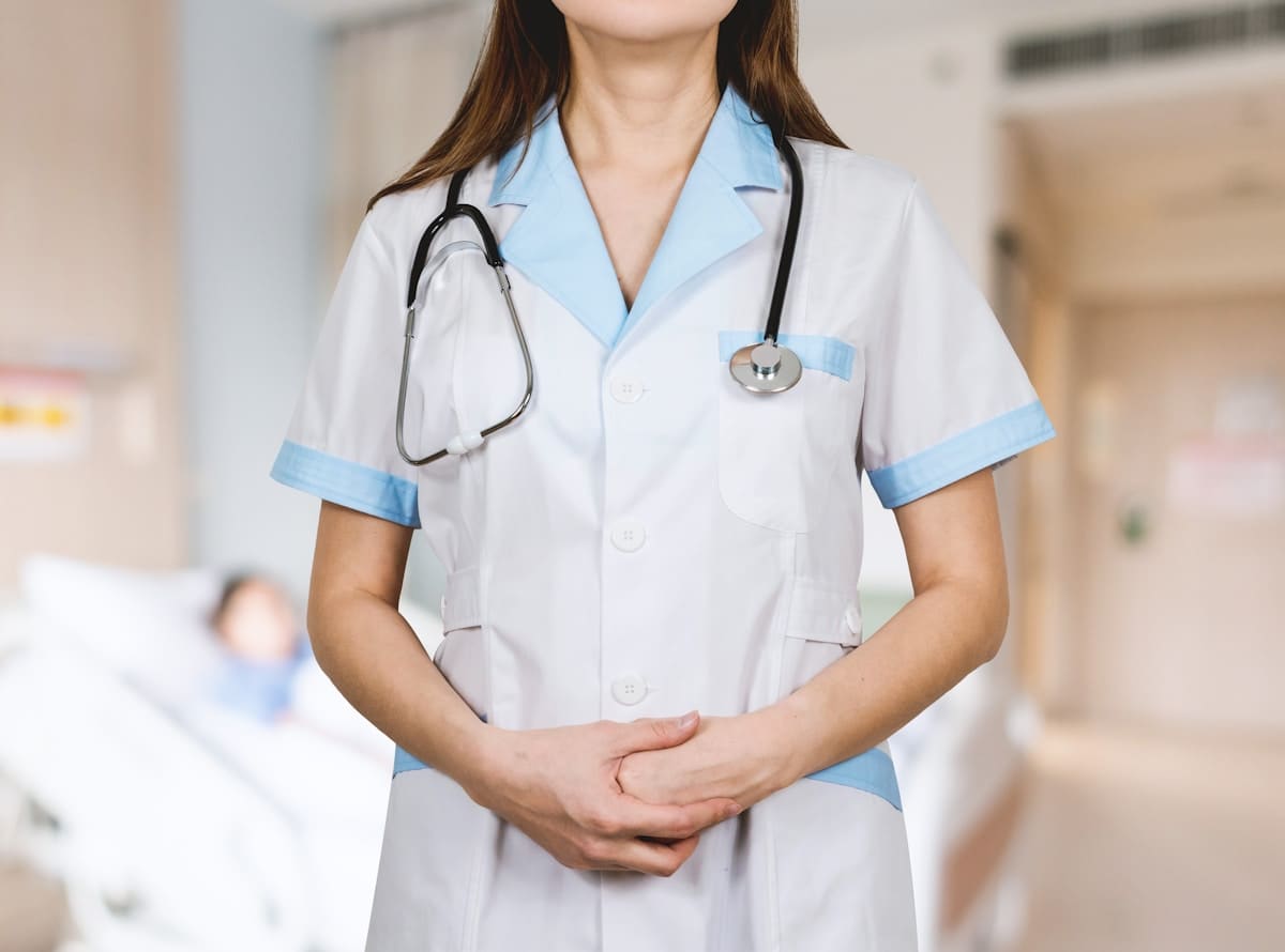 Doctor wearing a stethoscope for medical travel insurance cover