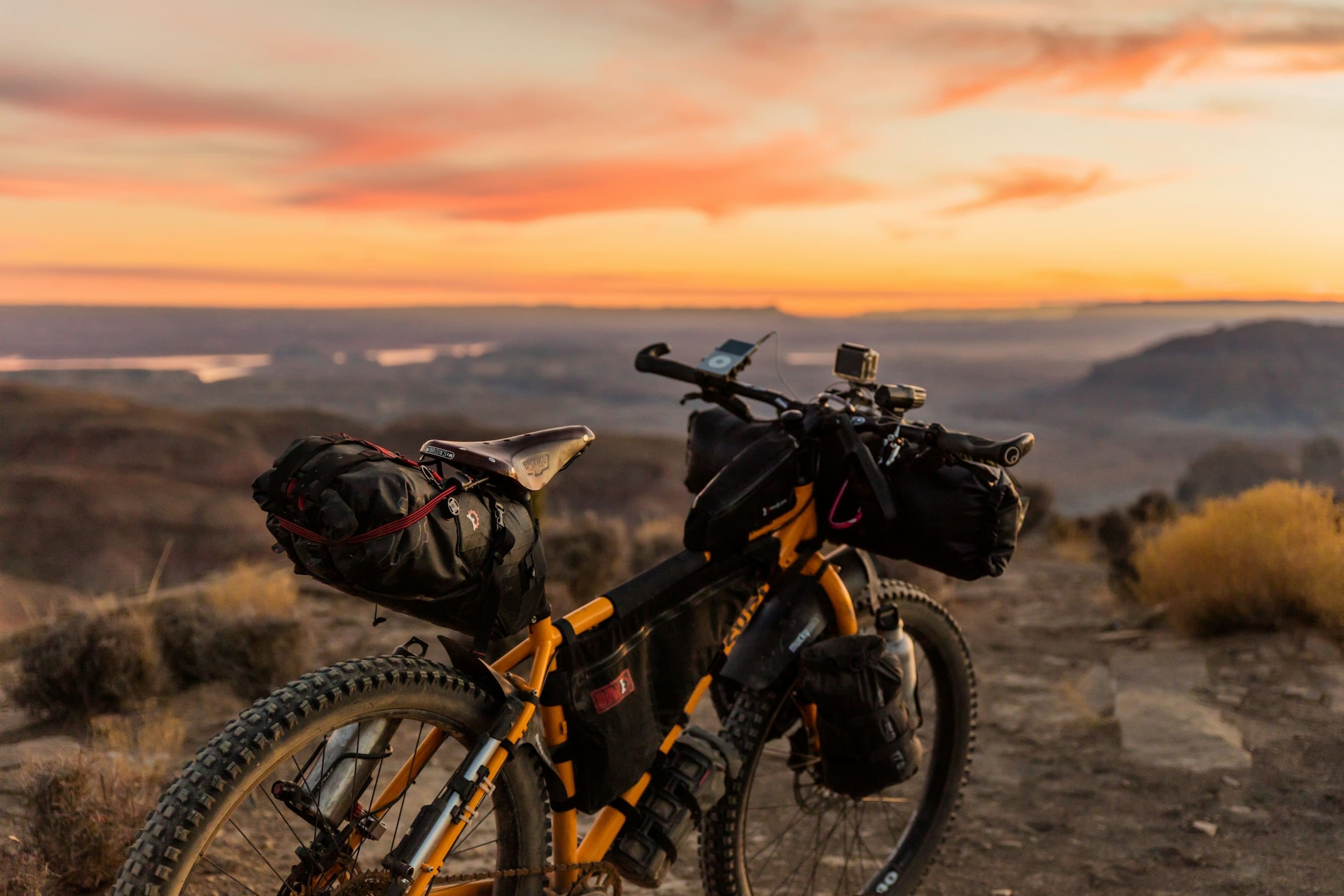 Independent traveller overlooking mountain trails